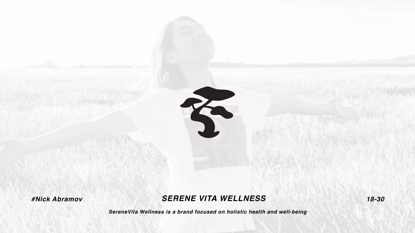 SereneVita Wellness logo — a brush-style bonsai tree mark on a t-shirt worn by a woman in a field